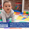 9 month old baby crawling on a mat on the floor for the featured image for our 9 Month Old Baby Development: Milestones and What to Expect blog