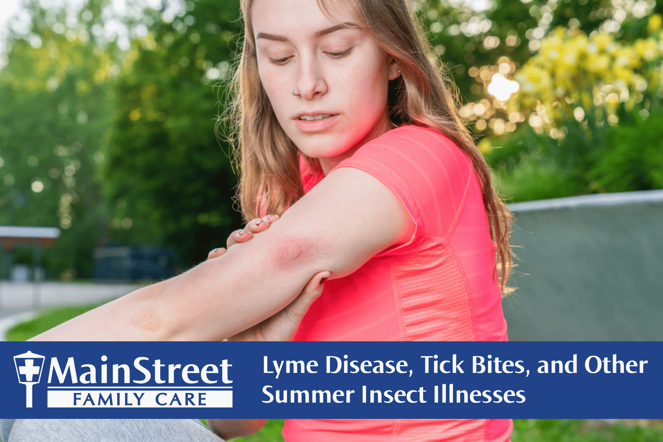 Woman in a pink shirt with an insect bite on her arm. Featured image for Lyme Disease, Tick Bites, and Other Summer Insect Illnesses blog.